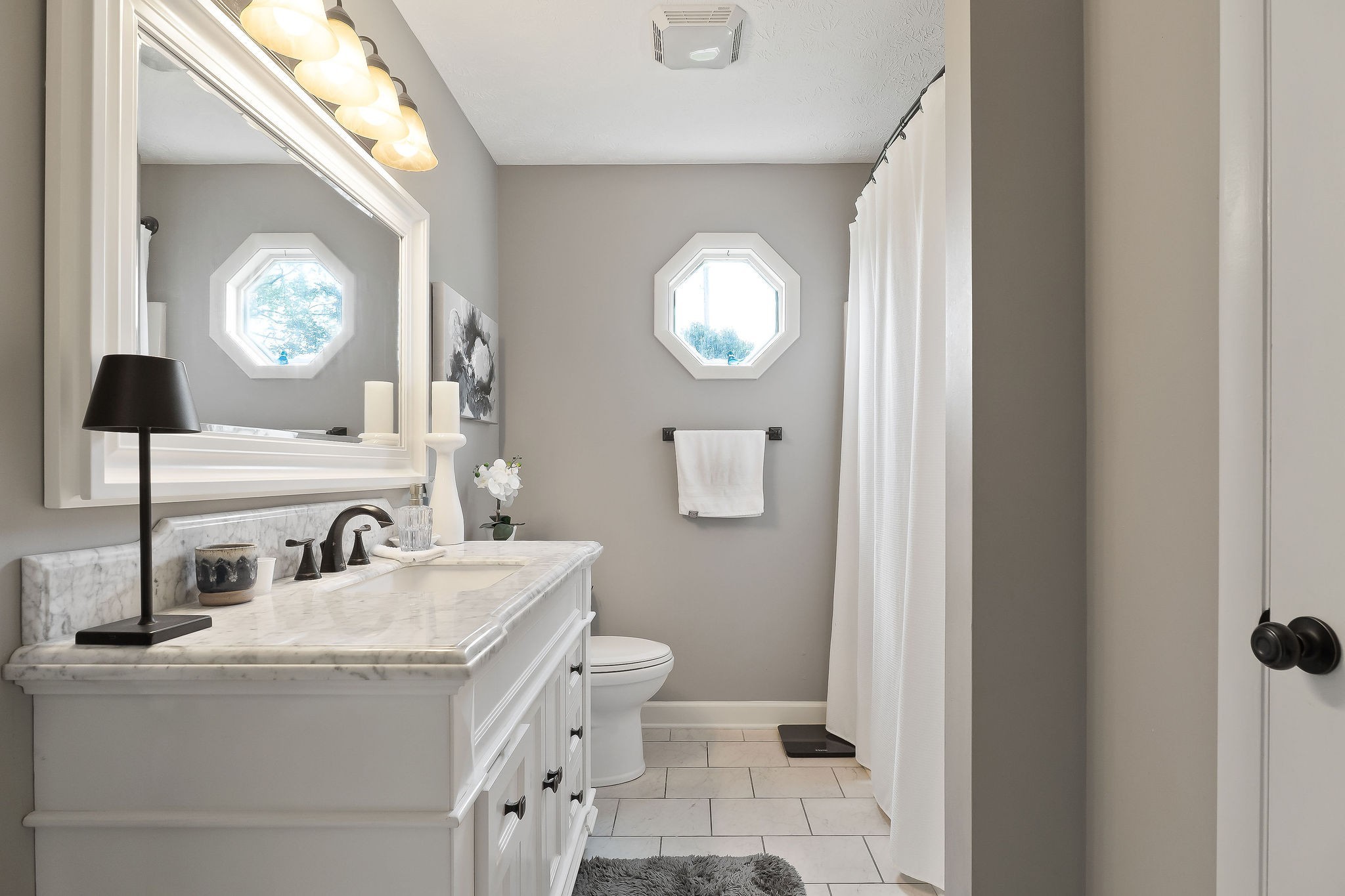 1051 Herman Lance Road Morrison, TN 37357 - Photo 19 of 57 a bathroom with a sink and a mirror