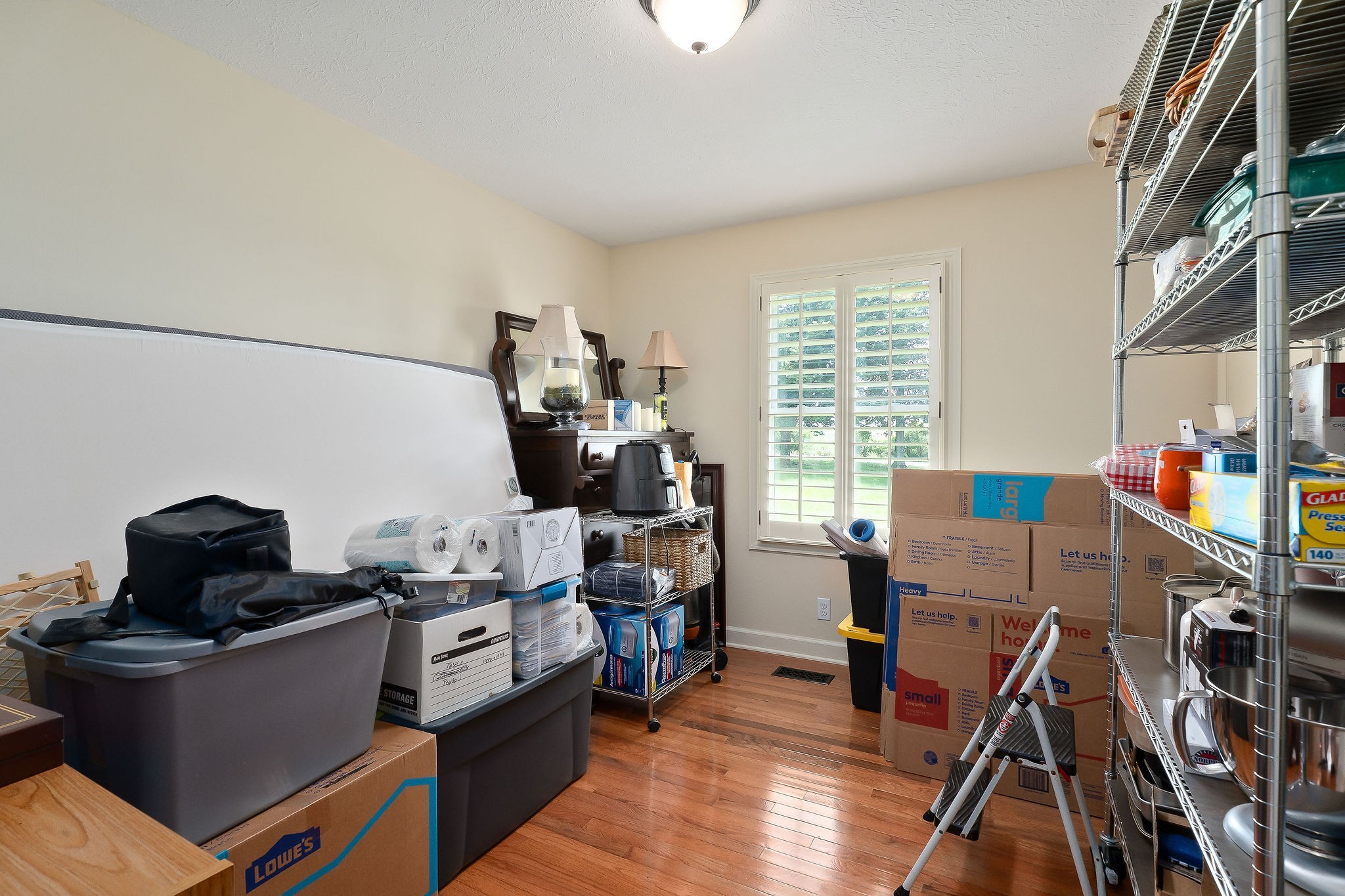 1051 Herman Lance Road Morrison, TN 37357 - Photo 24 of 57 a work room with furniture and a wooden floor
