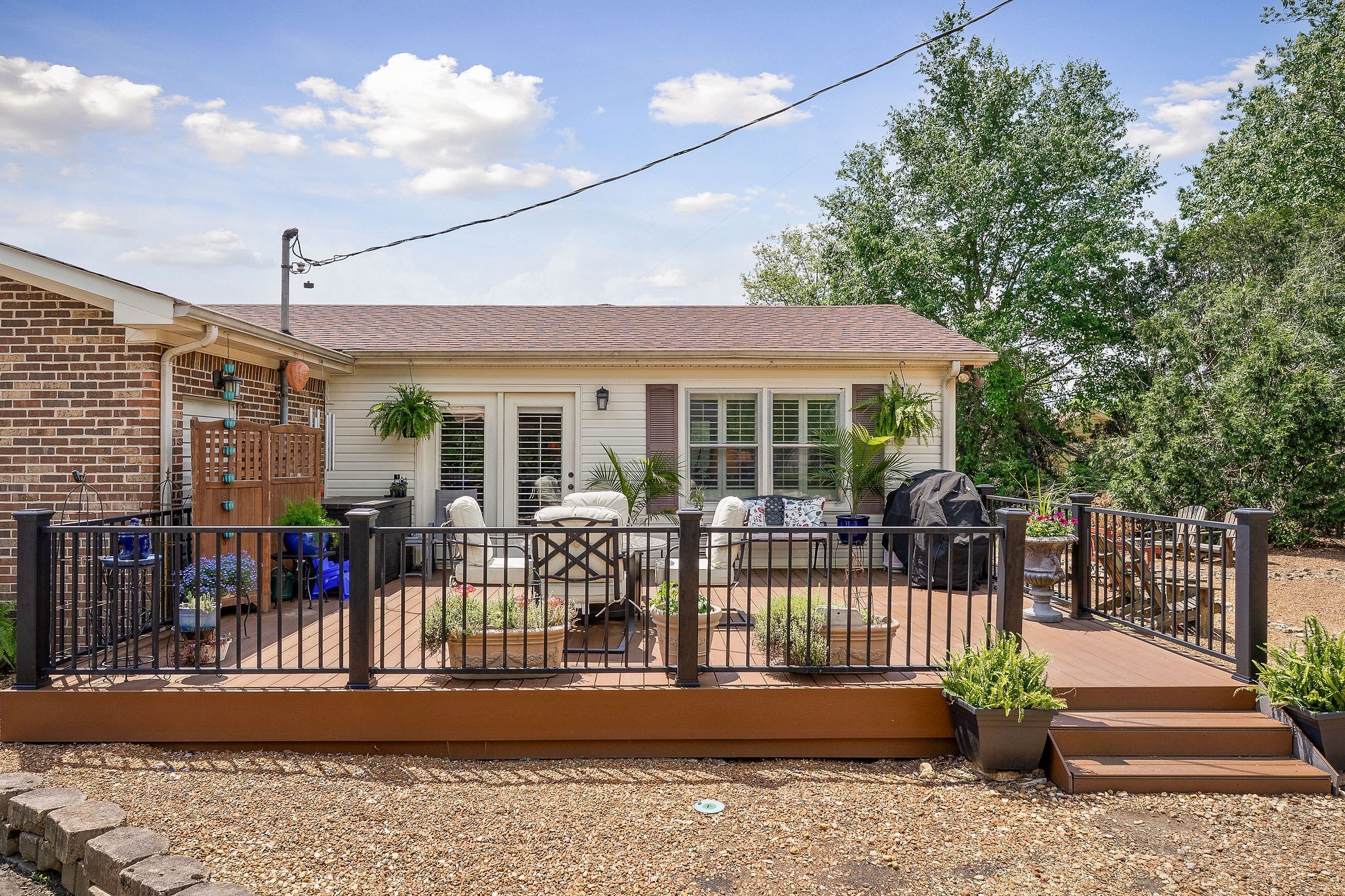 1051 Herman Lance Road Morrison, TN 37357 - Photo 28 of 57 a view of a house with a porch and furniture