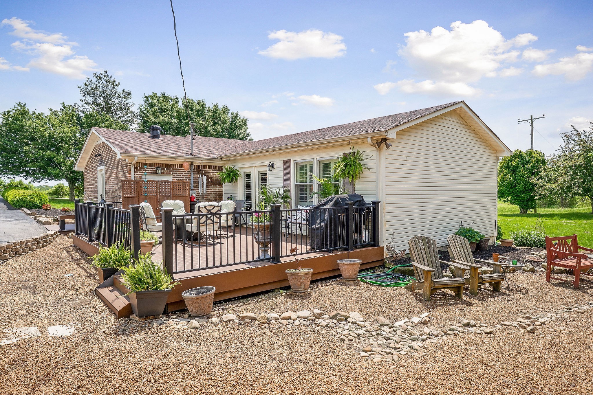 1051 Herman Lance Road Morrison, TN 37357 - Photo 29 of 57 a view of a house with backyard and sitting area