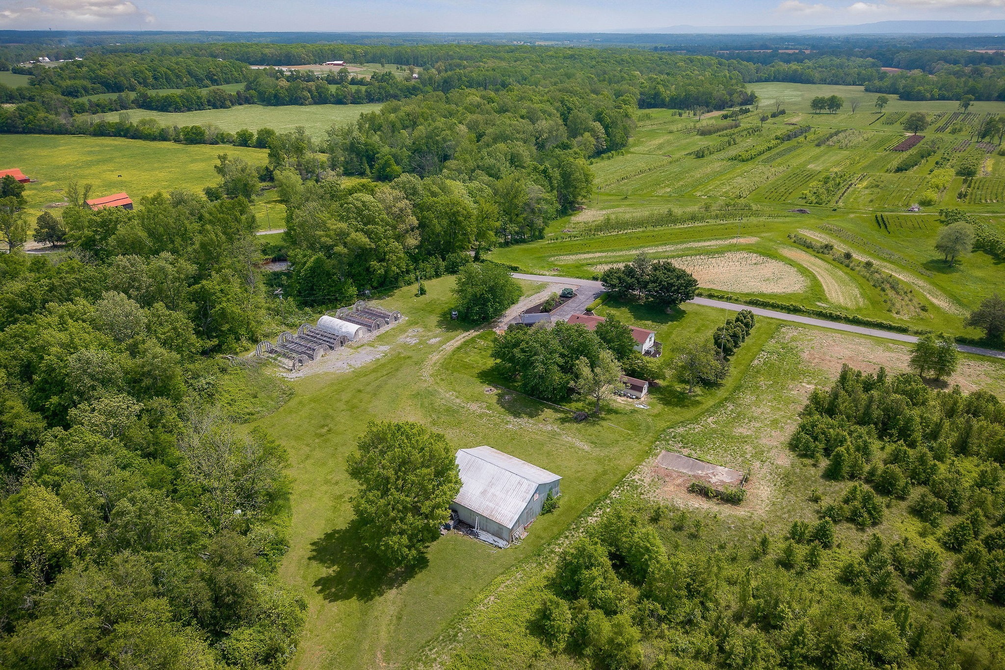 1051 Herman Lance Road Morrison, TN 37357 - Photo 47 of 57 a view of a lake with a houses