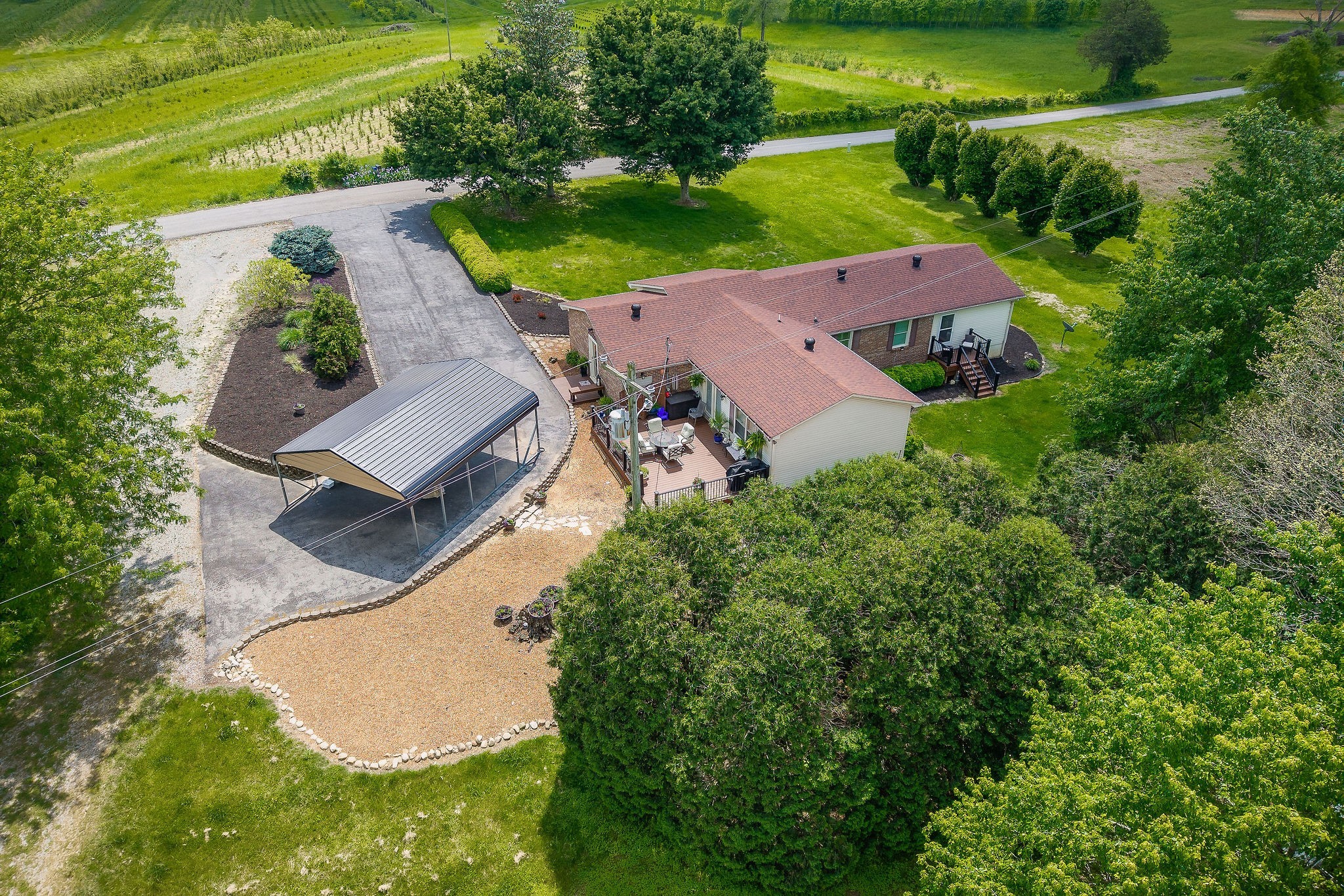 1051 Herman Lance Road Morrison, TN 37357 - Photo 53 of 57 an aerial view of a house with garden space and street view