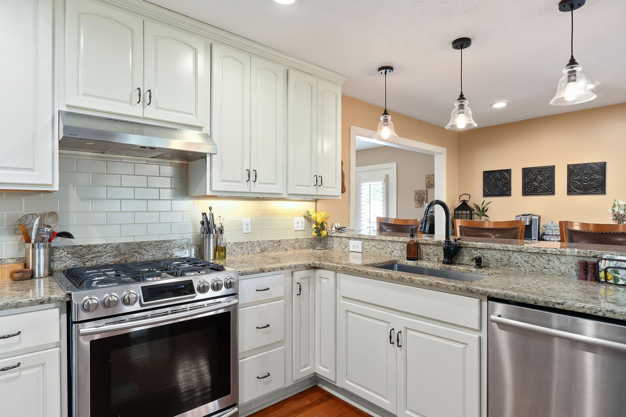 1051 Herman Lance Road Morrison, TN 37357 - Photo 9 of 57 a kitchen with granite countertop cabinets stainless steel appliances and a sink
