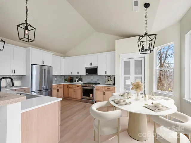 a view of a dining room with furniture