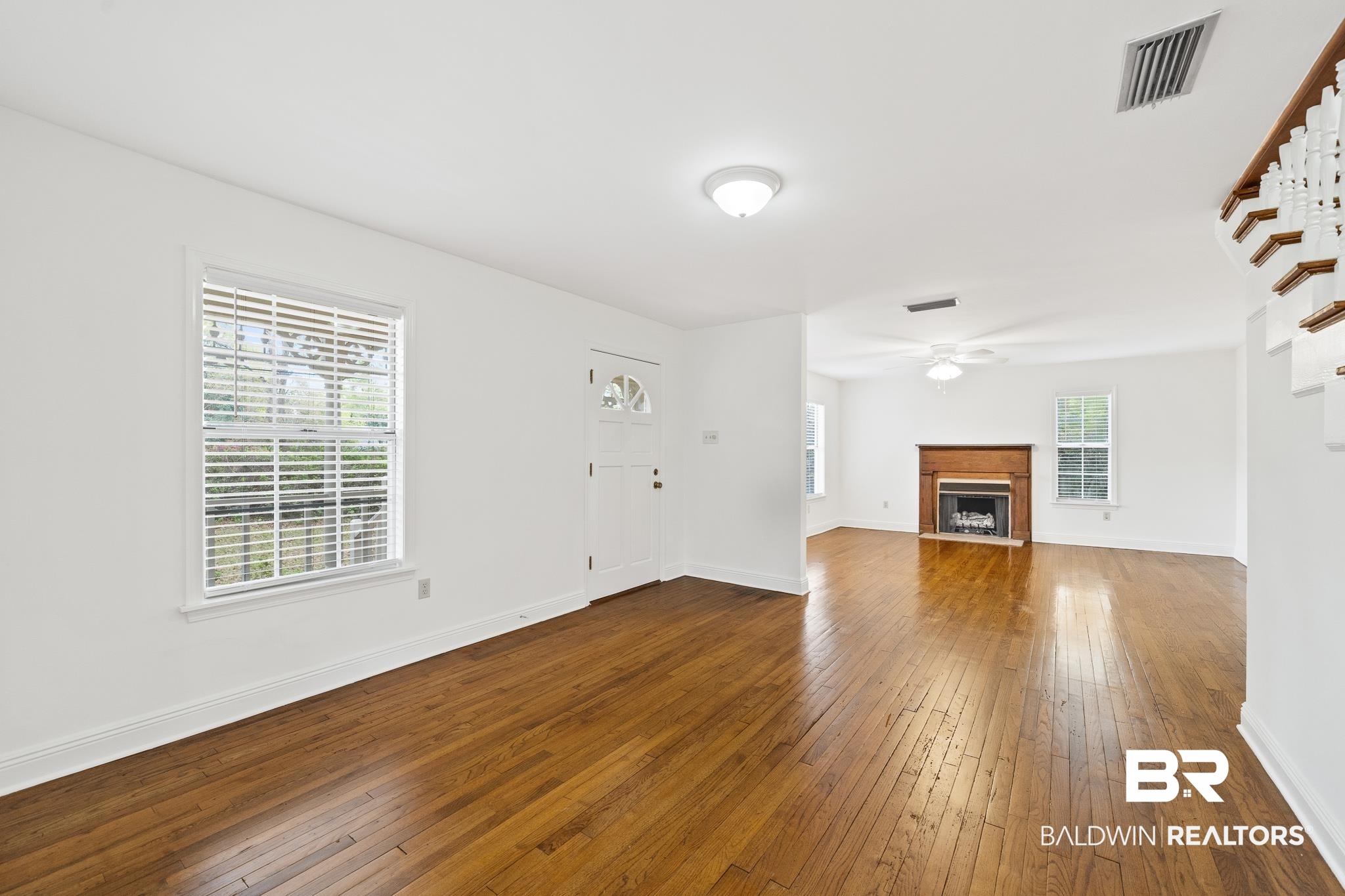 304 Liberty Street Fairhope, AL 36532 - Photo 2 of 25 Large dining area opens to living room