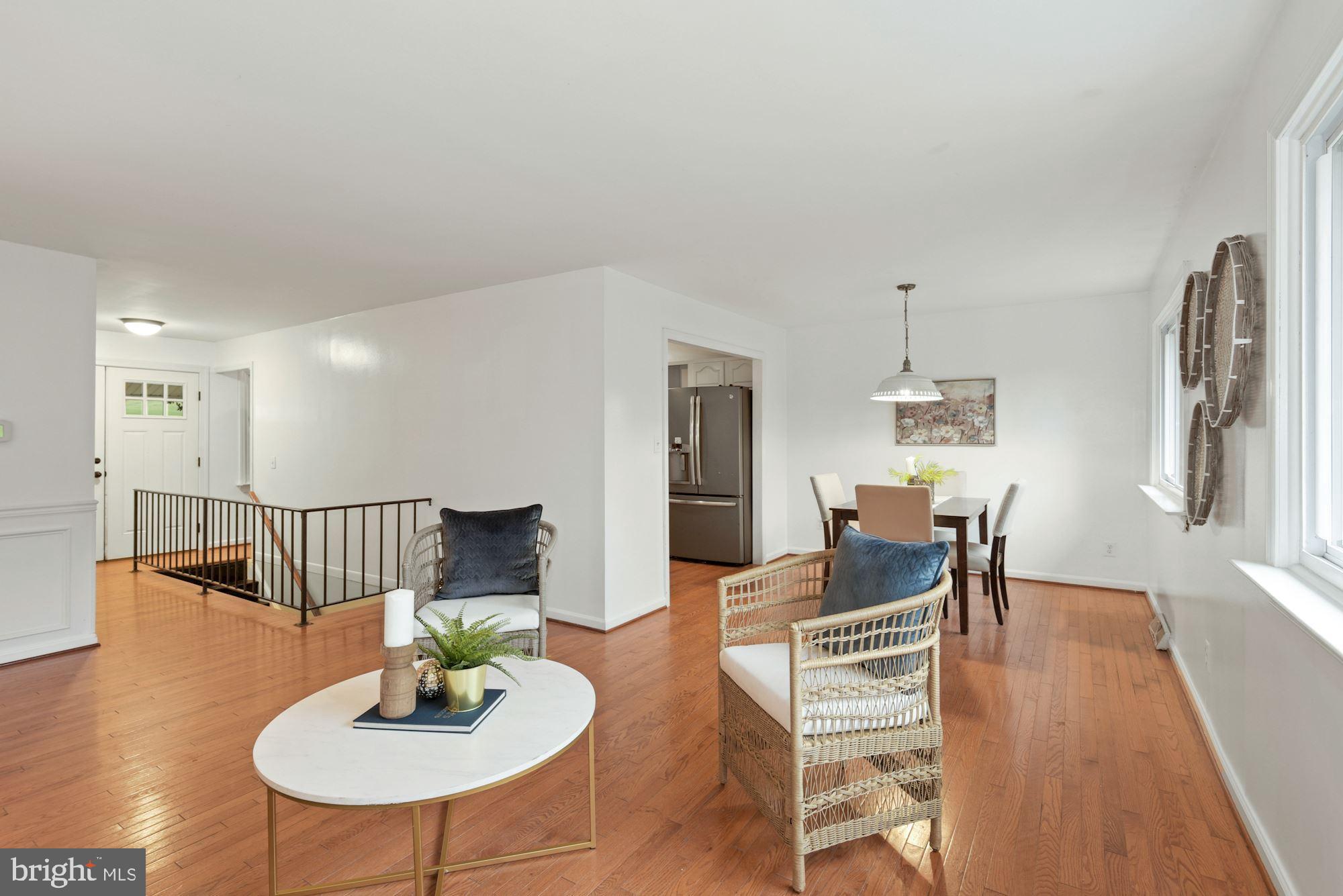 2120 Round Hill Road Fallston, MD 21047 - Photo 5 of 24 a living room with furniture and a dining table with wooden floor