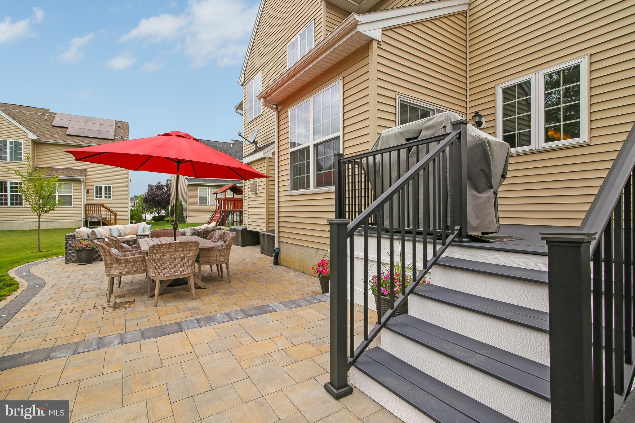 504 Windsor Road Mullica Hill, NJ 08062 - Photo 41 of 48 Trex Enhanced Deck&Cambridge Pavers w/ puck lights