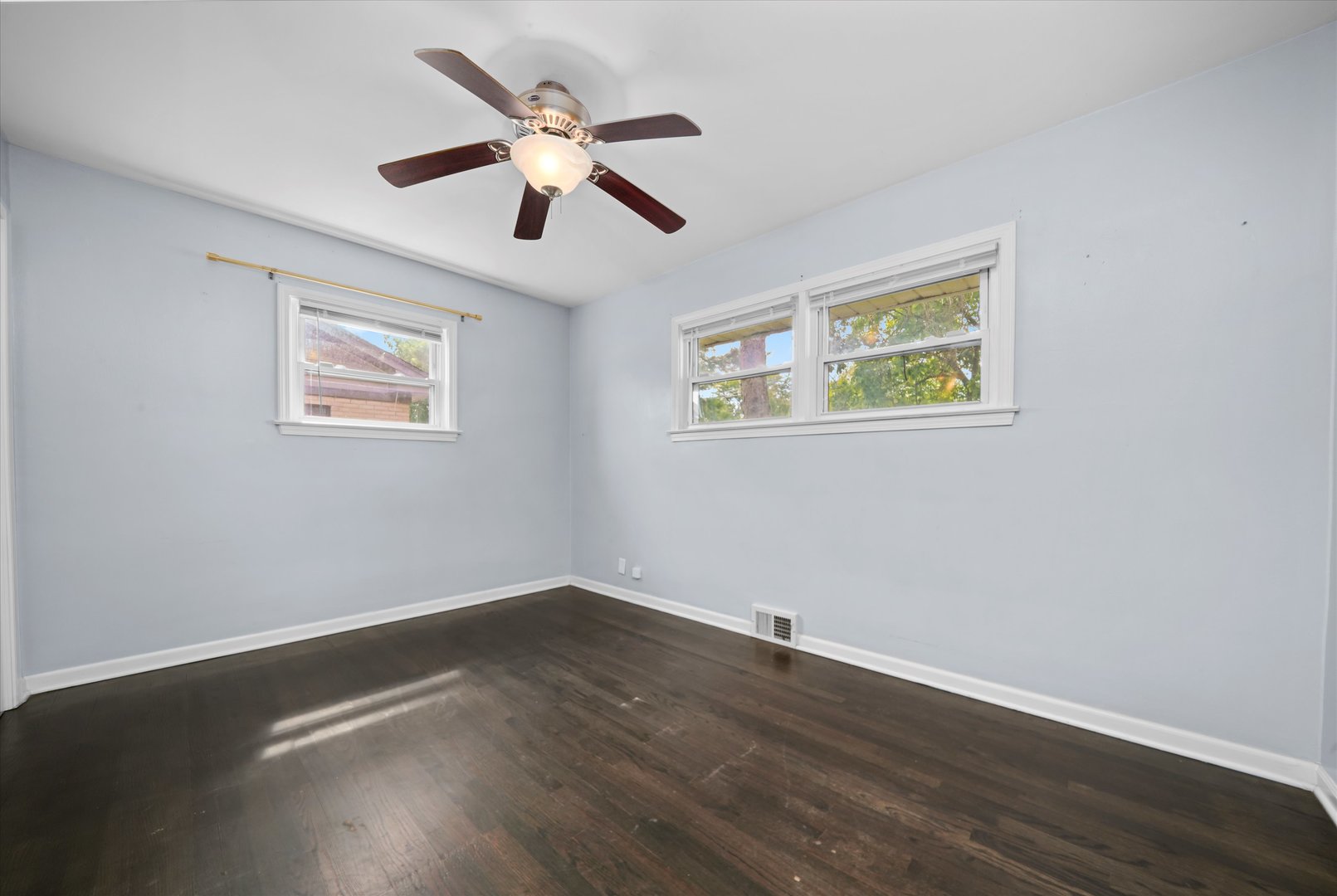 706 North Main Street Mount Prospect, IL 60056 - Photo 6 of 14 a view of room with wooden floor and ceiling fan