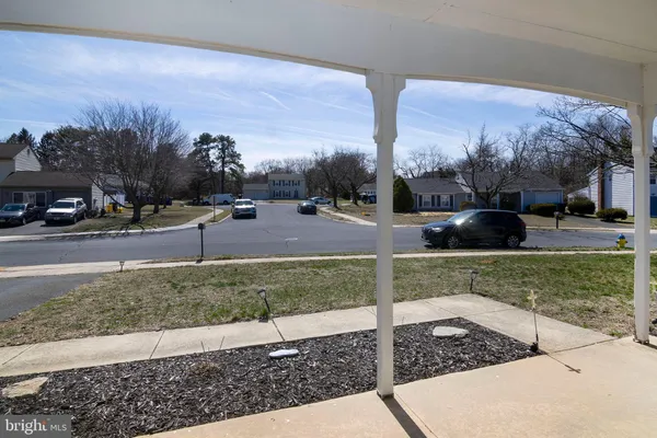 a view of a yard and front view of a building