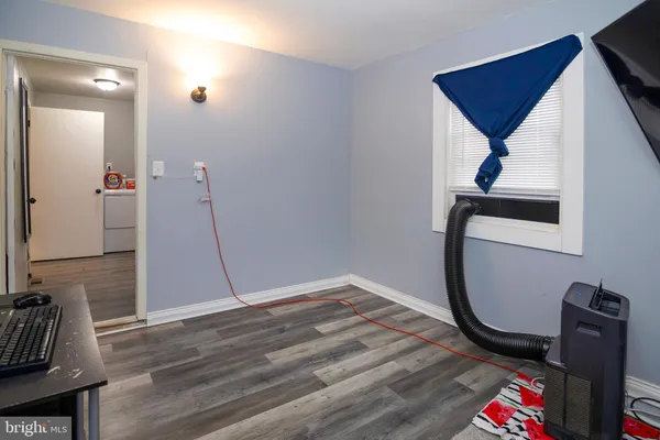 a view of a hallway with workspace