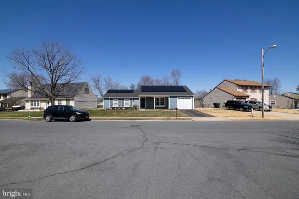 a car parked on the side of a street