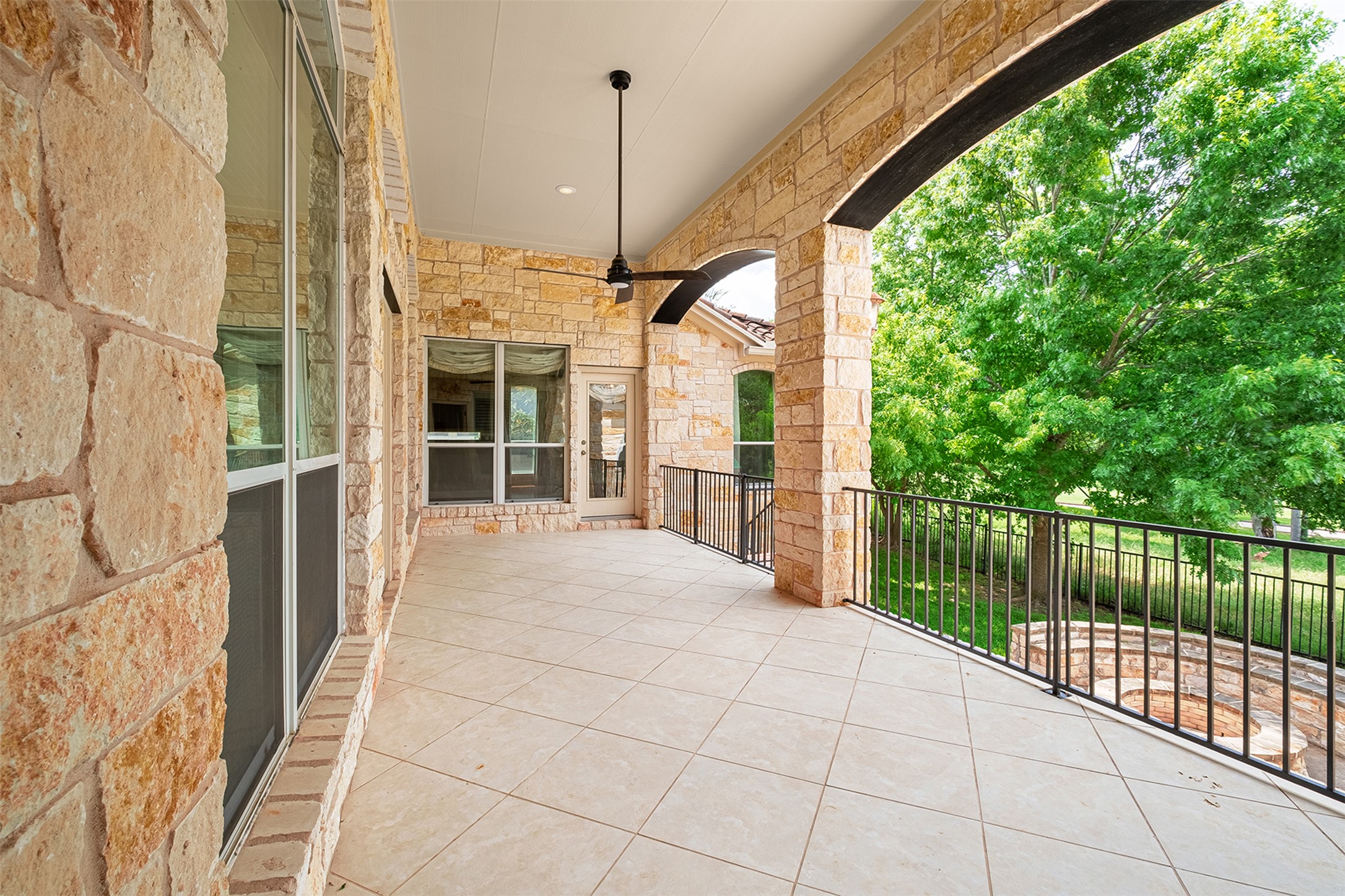 14909 Spillman Ranch Loop Austin, TX 78738 - Photo 35 of 40 View of patio with a ceiling fan and a balcony