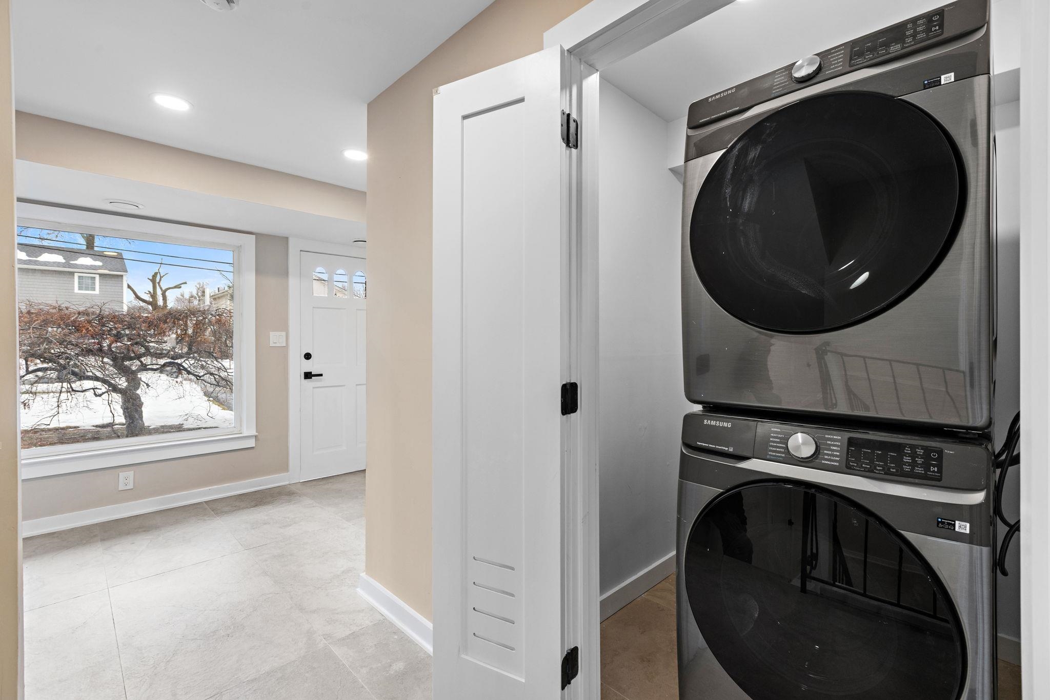 125 Rutgers Place Clifton, NJ 07013 - Photo 29 of 36 a view of a storage and utility room with washer and dryer