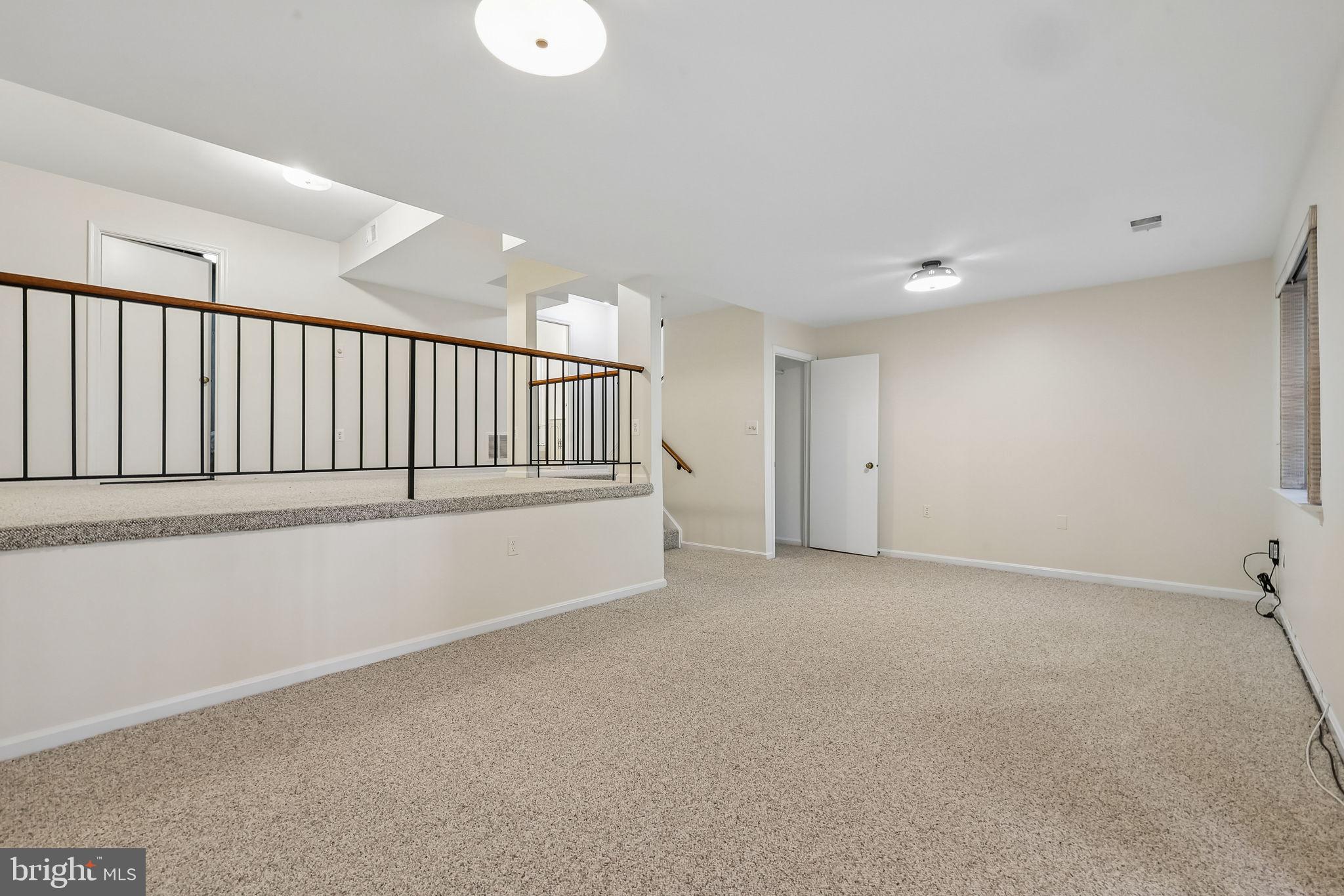 11714 Dry River Court Reston, VA 20191 - Photo 14 of 24 a view of an empty room with a window