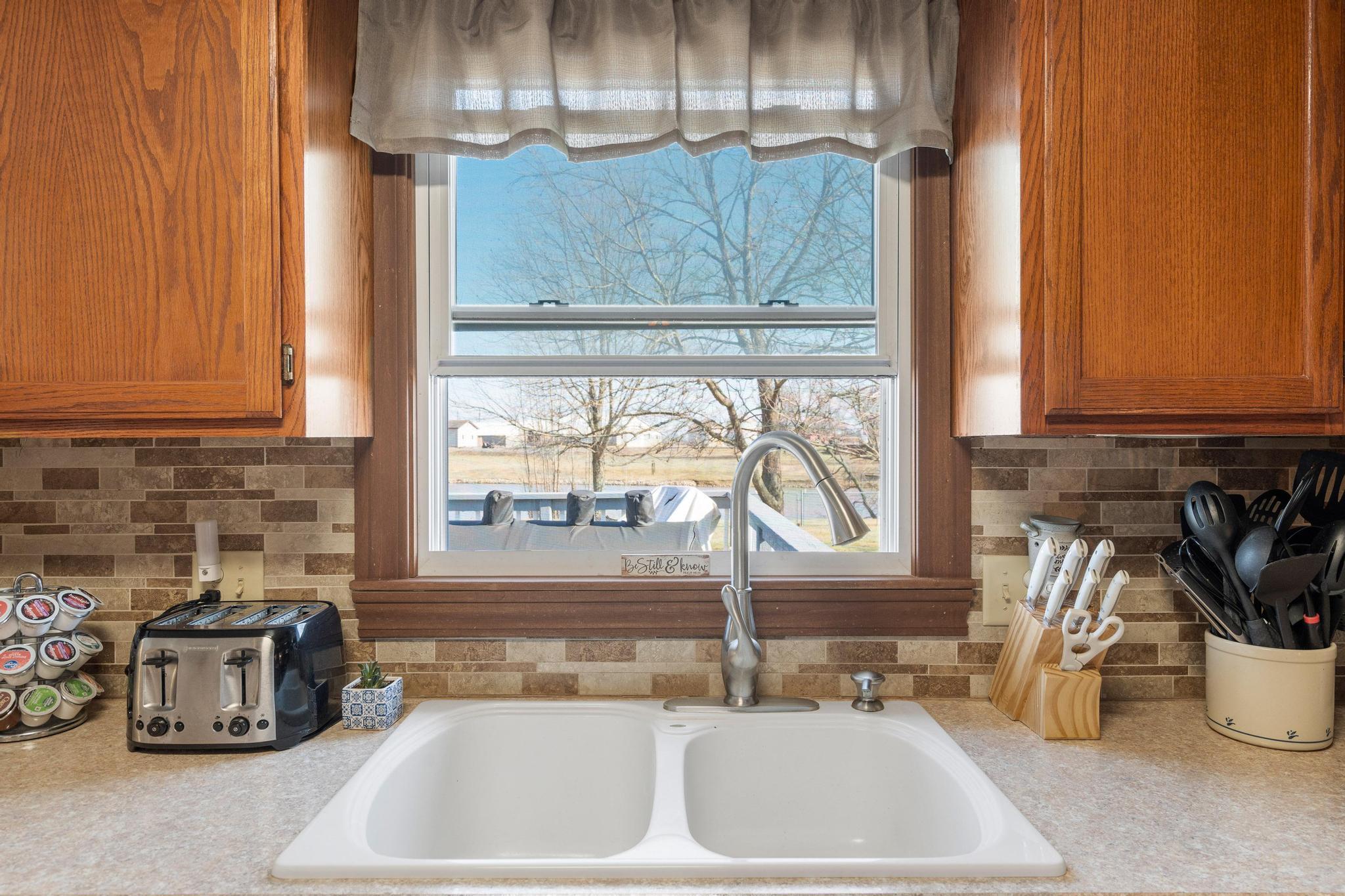 75 South State Rte 72 Sabina, OH 45169 - Photo 26 of 48 sink overlooking pond view