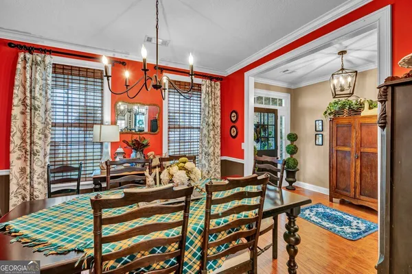 a living room with furniture fireplace and a window