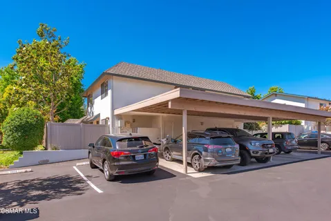 a car parked in front of a garage