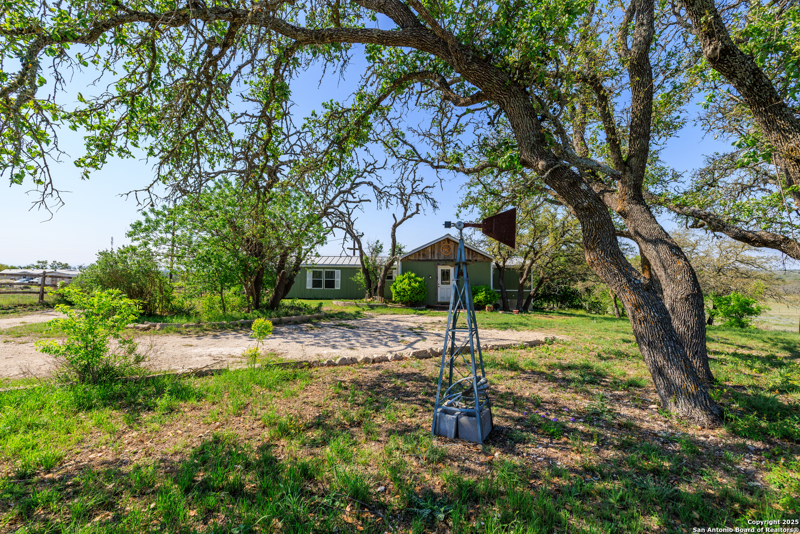 453 Reeves Lane Harper, TX 78631 - Photo 1 of 31 a view of a garden with a tree