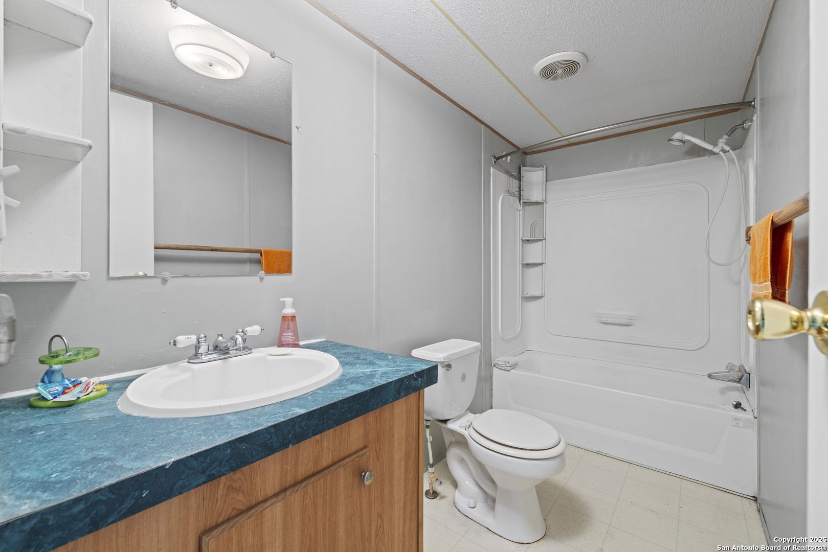453 Reeves Lane Harper, TX 78631 - Photo 13 of 31 a bathroom with a sink toilet and shower