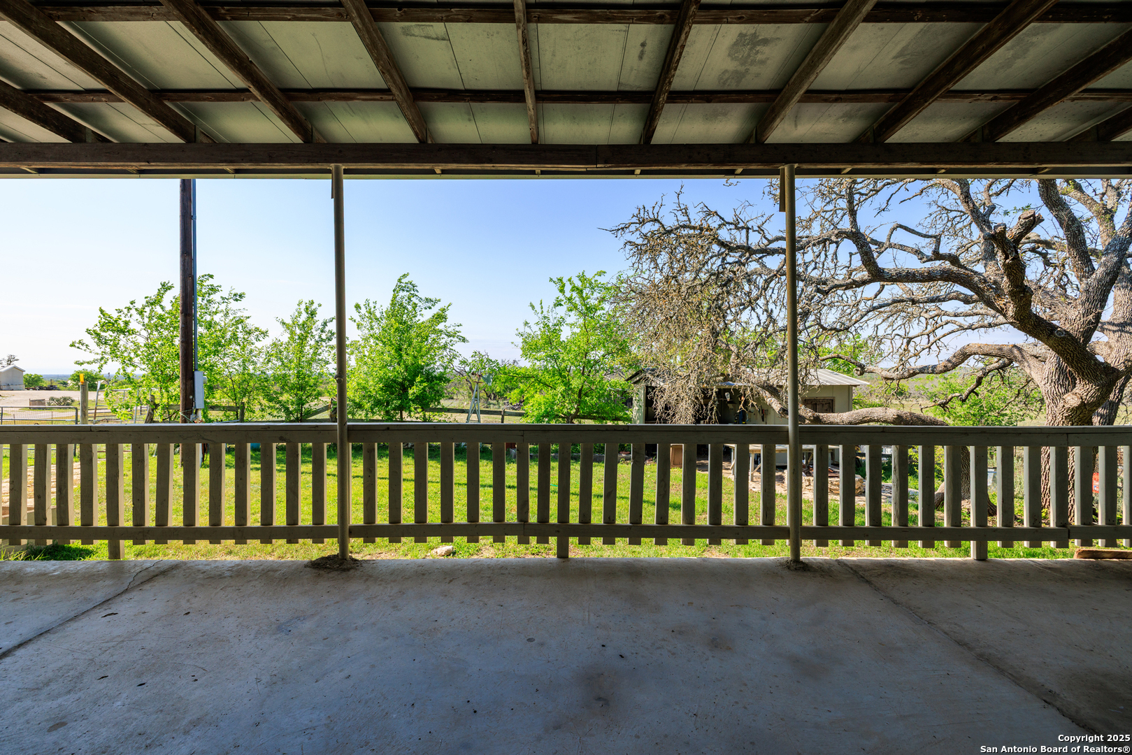 453 Reeves Lane Harper, TX 78631 - Photo 19 of 31 a view of a porch with a yard