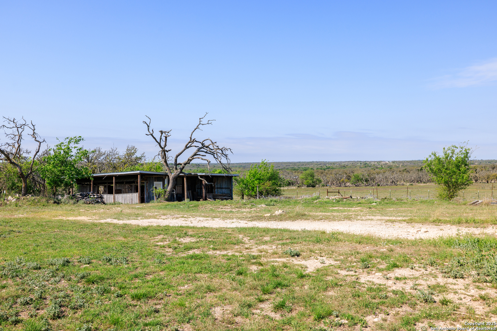 453 Reeves Lane Harper, TX 78631 - Photo 22 of 31 a front view of a house with a yard