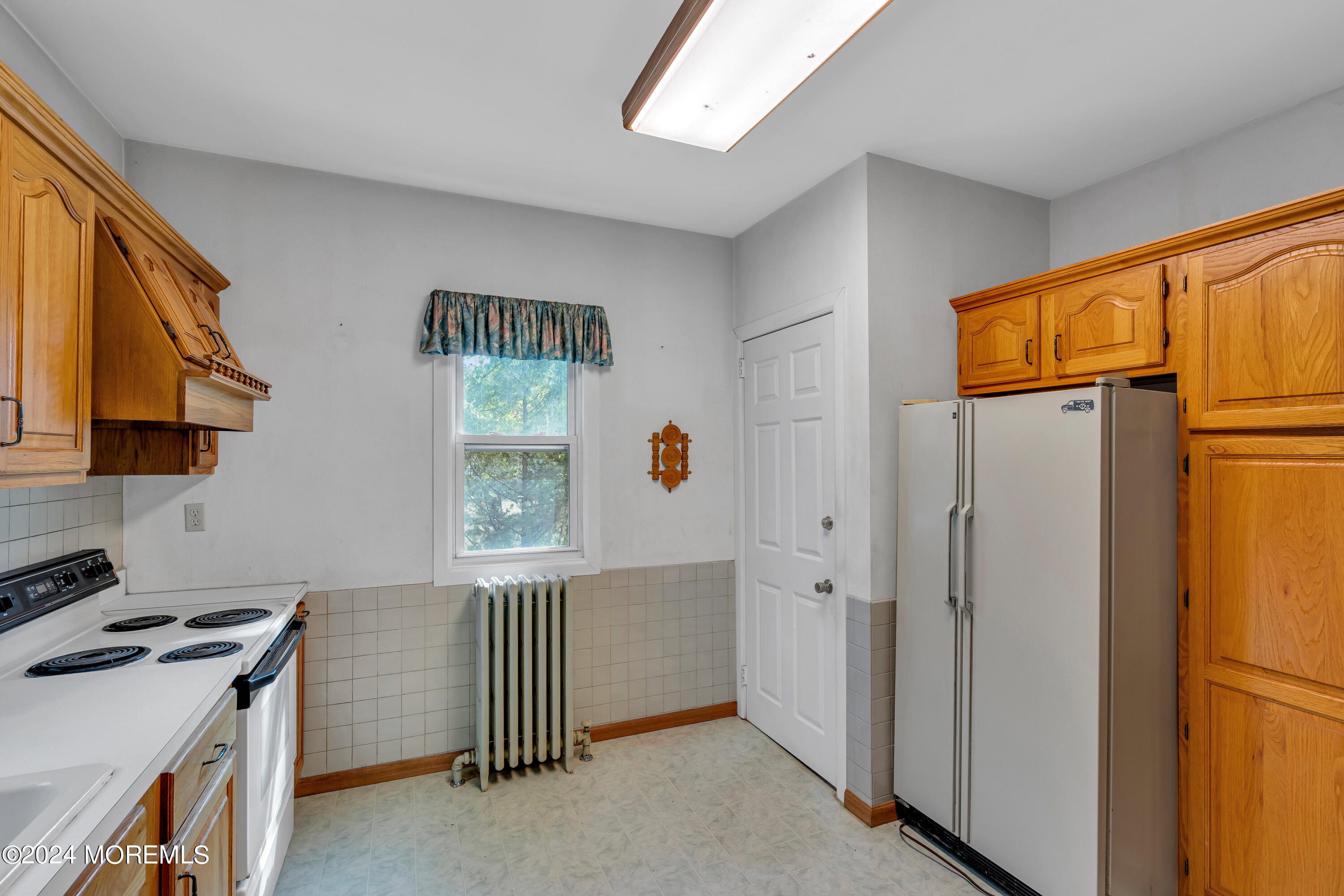 53 Estelle Lane Howell, NJ 07731 - Photo 12 of 36 a utility room with window washer and dryer