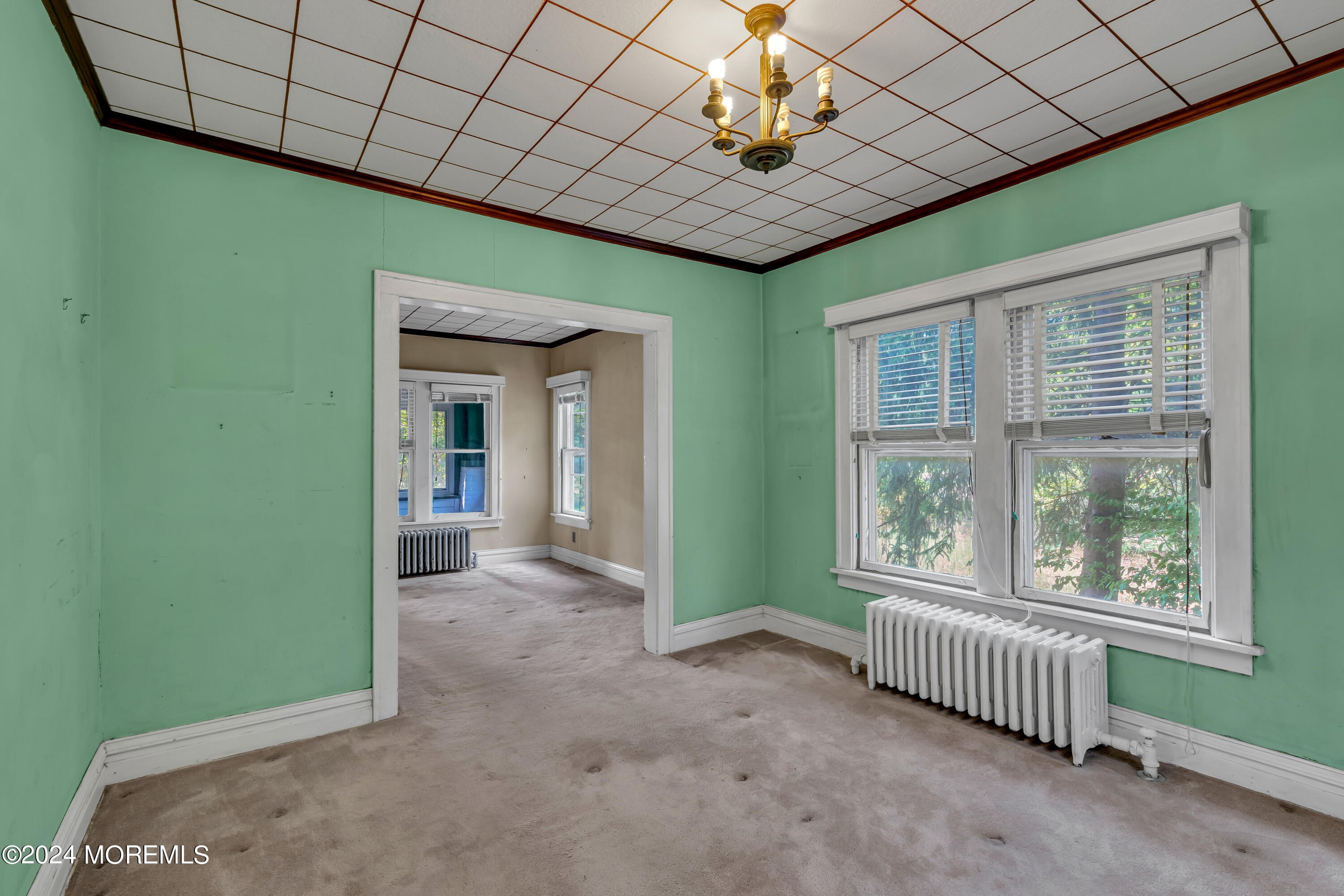 53 Estelle Lane Howell, NJ 07731 - Photo 15 of 36 en empty room with windows and ceiling fan