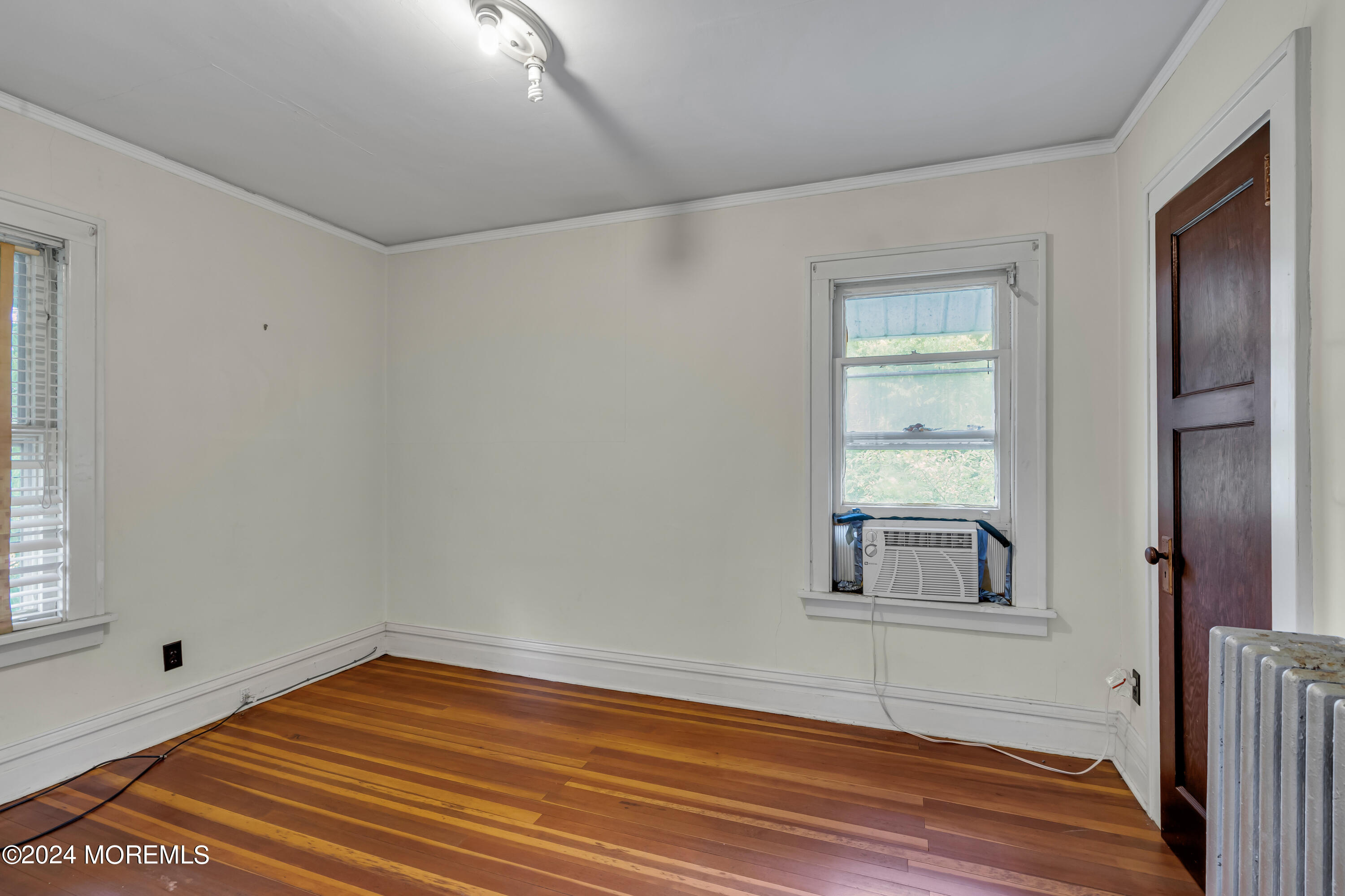 53 Estelle Lane Howell, NJ 07731 - Photo 21 of 36 a view of empty room with wooden floor