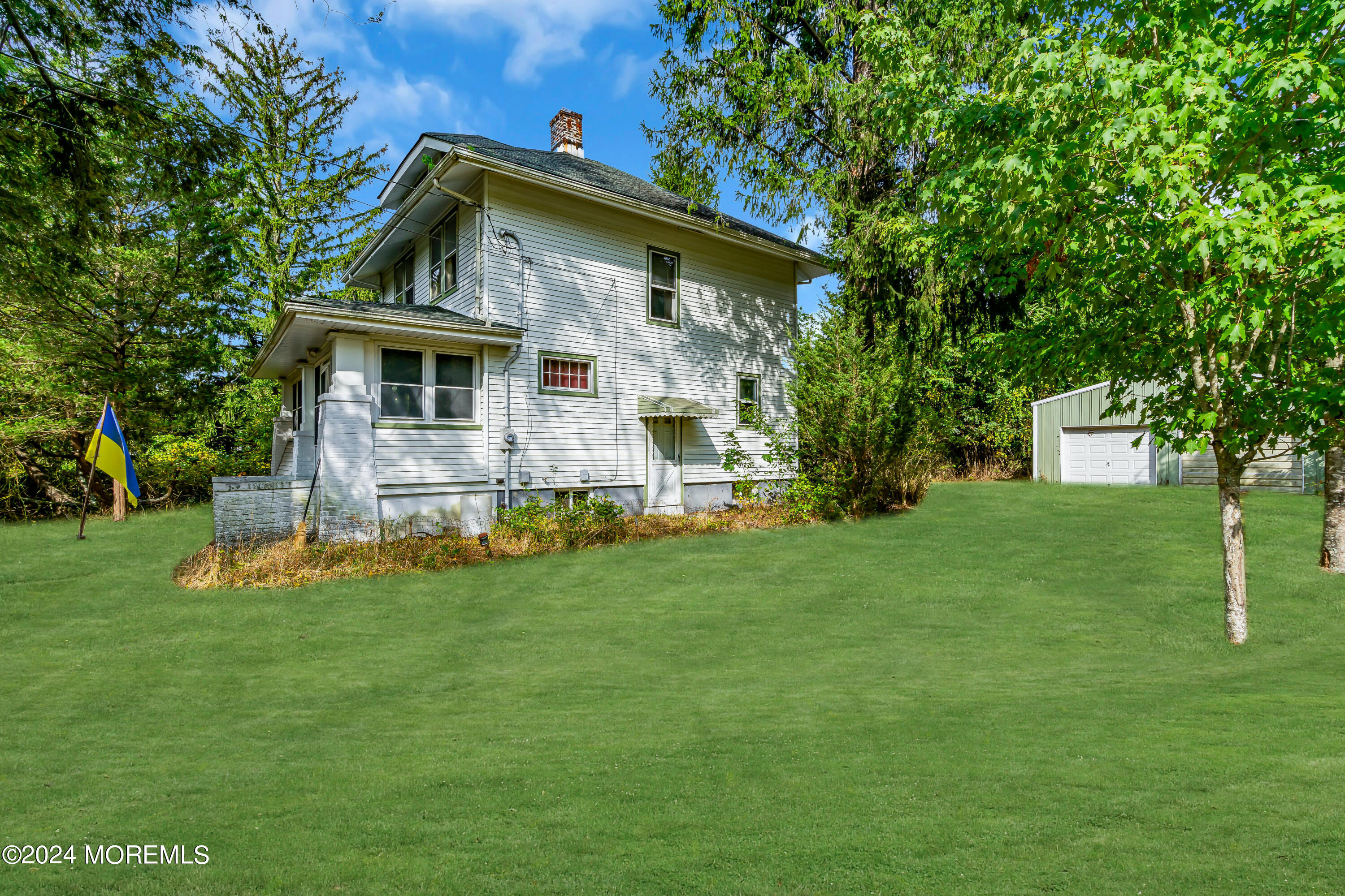 53 Estelle Lane Howell, NJ 07731 - Photo 29 of 36 a front view of house with yard and green space