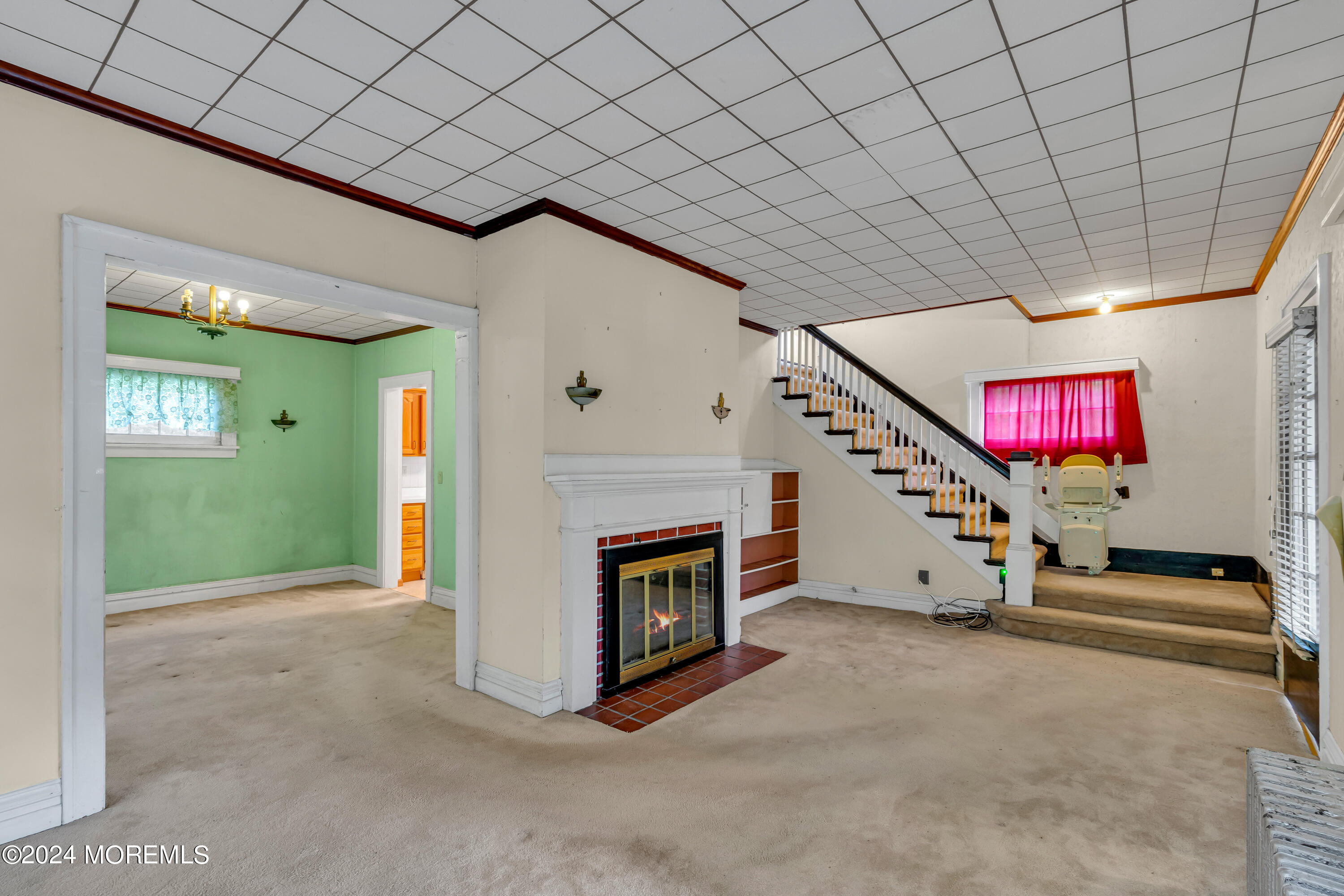 53 Estelle Lane Howell, NJ 07731 - Photo 10 of 36 a view of an empty room with a fireplace and window