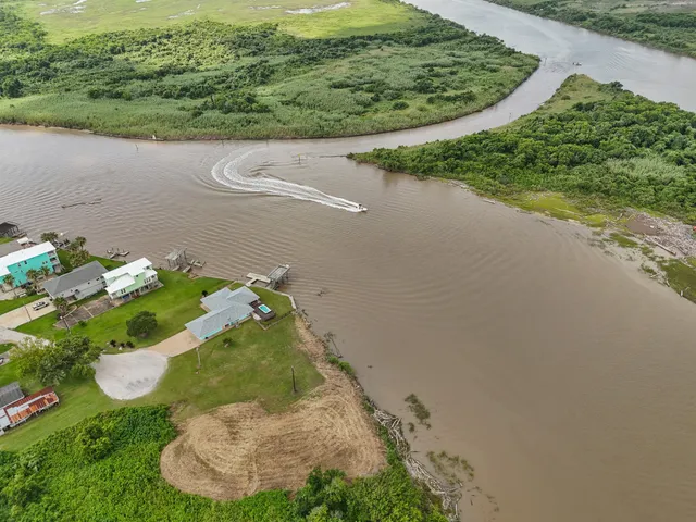 a view of a lake from a yard