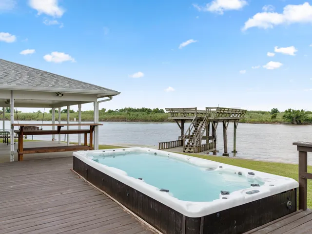 a view of sitting area with lake view