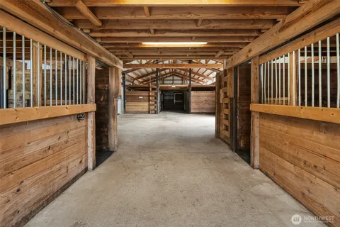 a view of a hallway with stairs