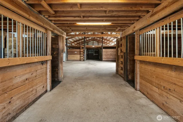 a view of a hallway with stairs