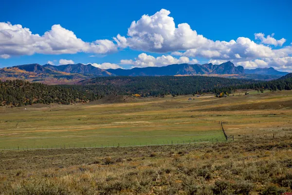 a view of an ocean and a mountain view