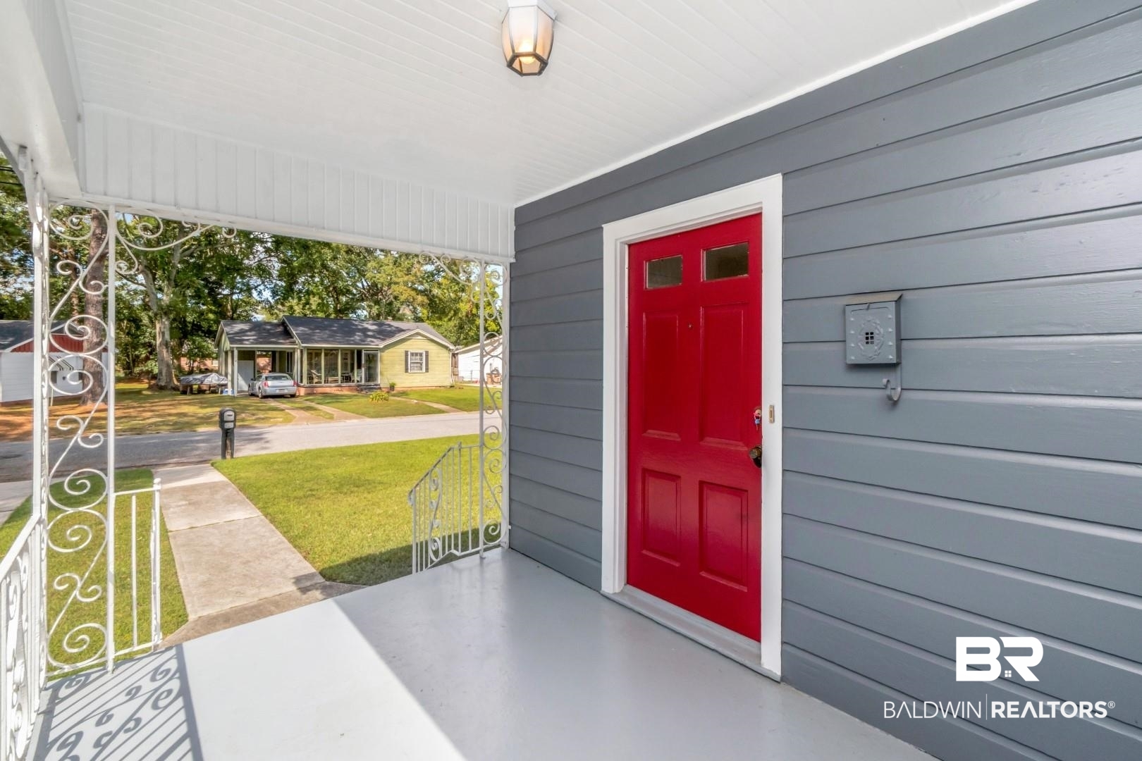 1477 Fairfield Street Mobile, AL 36606 - Photo 6 of 34 Doorway to property featuring a porch and a yard