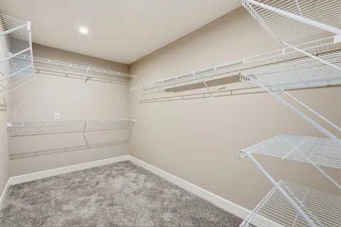 a view of a room with racks on the wall