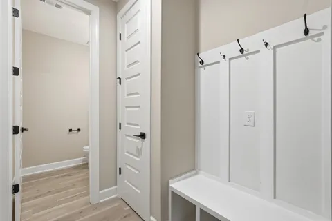 a bathroom with a shower and a sink