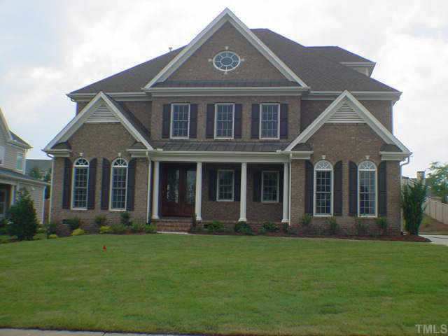 4809 Patton Ridge Court Raleigh, NC 27612 - Photo 1 of 1 a front view of a house with a garden