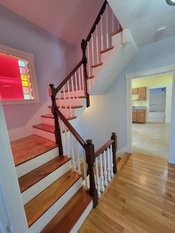 100 Medford Street, Unit 2 Malden, MA 02148 - Photo 18 of 29 a view of entryway and hall with wooden floor