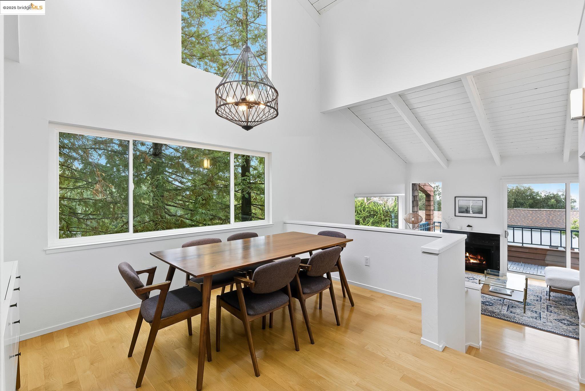 2 Sereno Circle Oakland, CA 94619 - Photo 11 of 42 a view of a dining room with furniture window and wooden floor