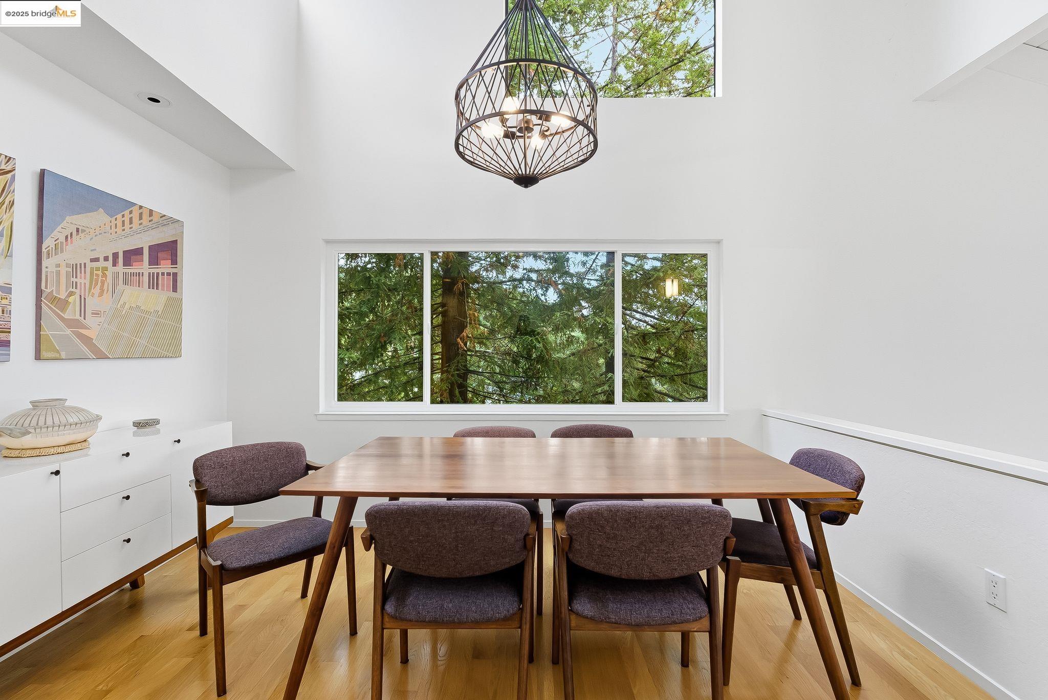 2 Sereno Circle Oakland, CA 94619 - Photo 13 of 42 a view of a dining room with furniture and wooden floor