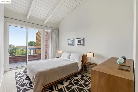 a view of balcony with wooden floor