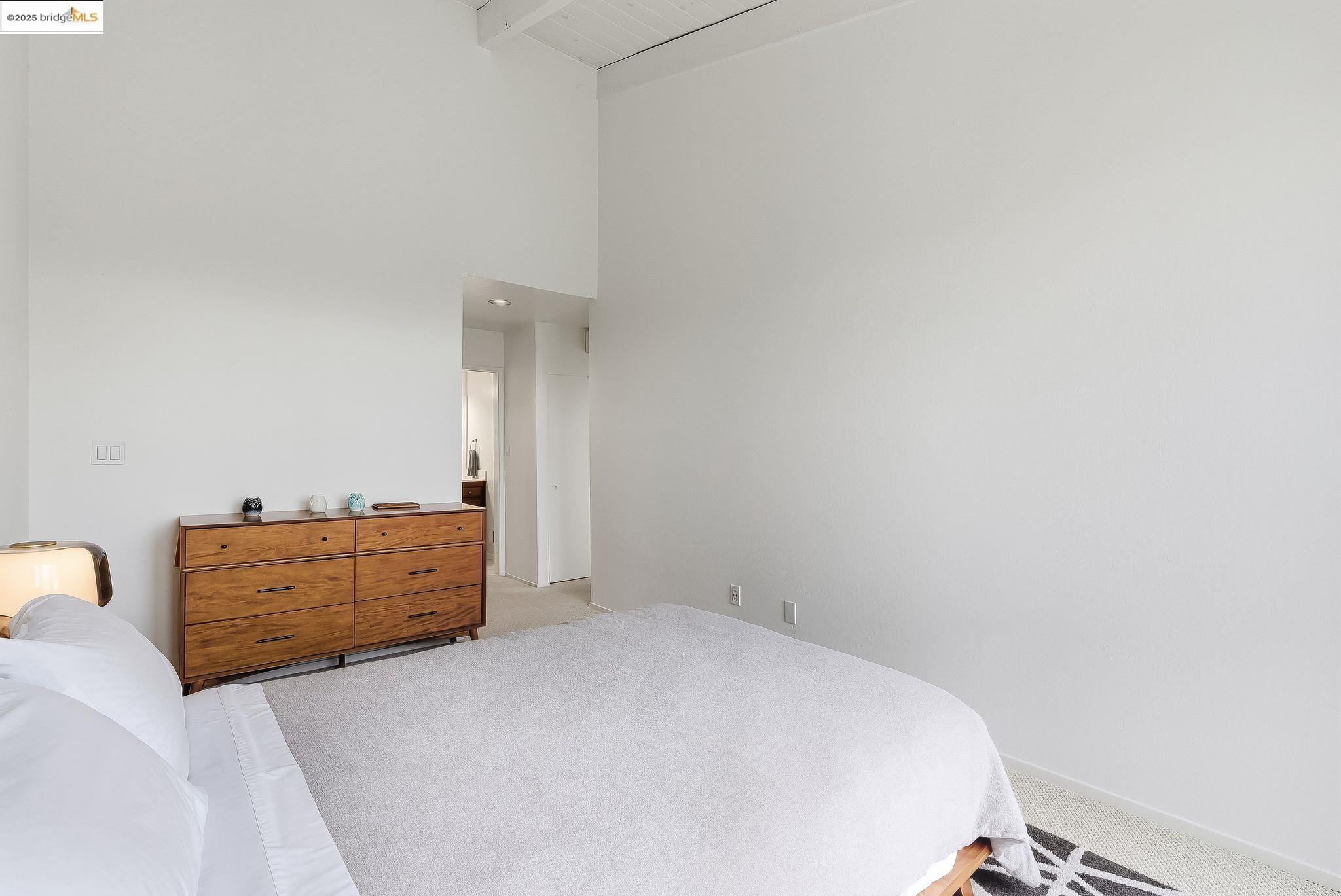 2 Sereno Circle Oakland, CA 94619 - Photo 17 of 42 a bedroom with a bed and cabinets