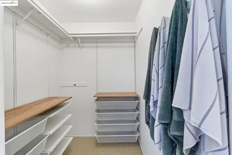 a bathroom with a double vanity sink mirror and toilet