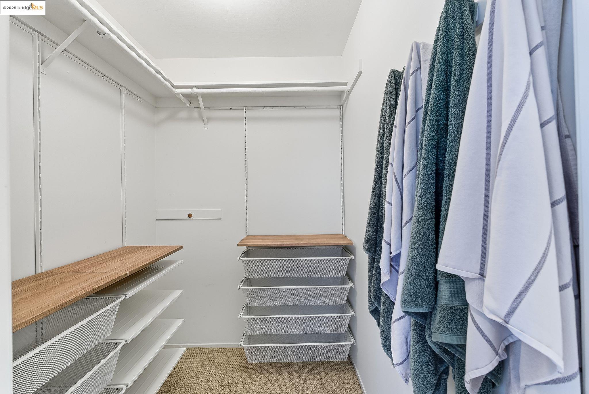 2 Sereno Circle Oakland, CA 94619 - Photo 19 of 42 a view of walk in closet with empty racks