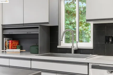 a view of a wooden deck with a yard