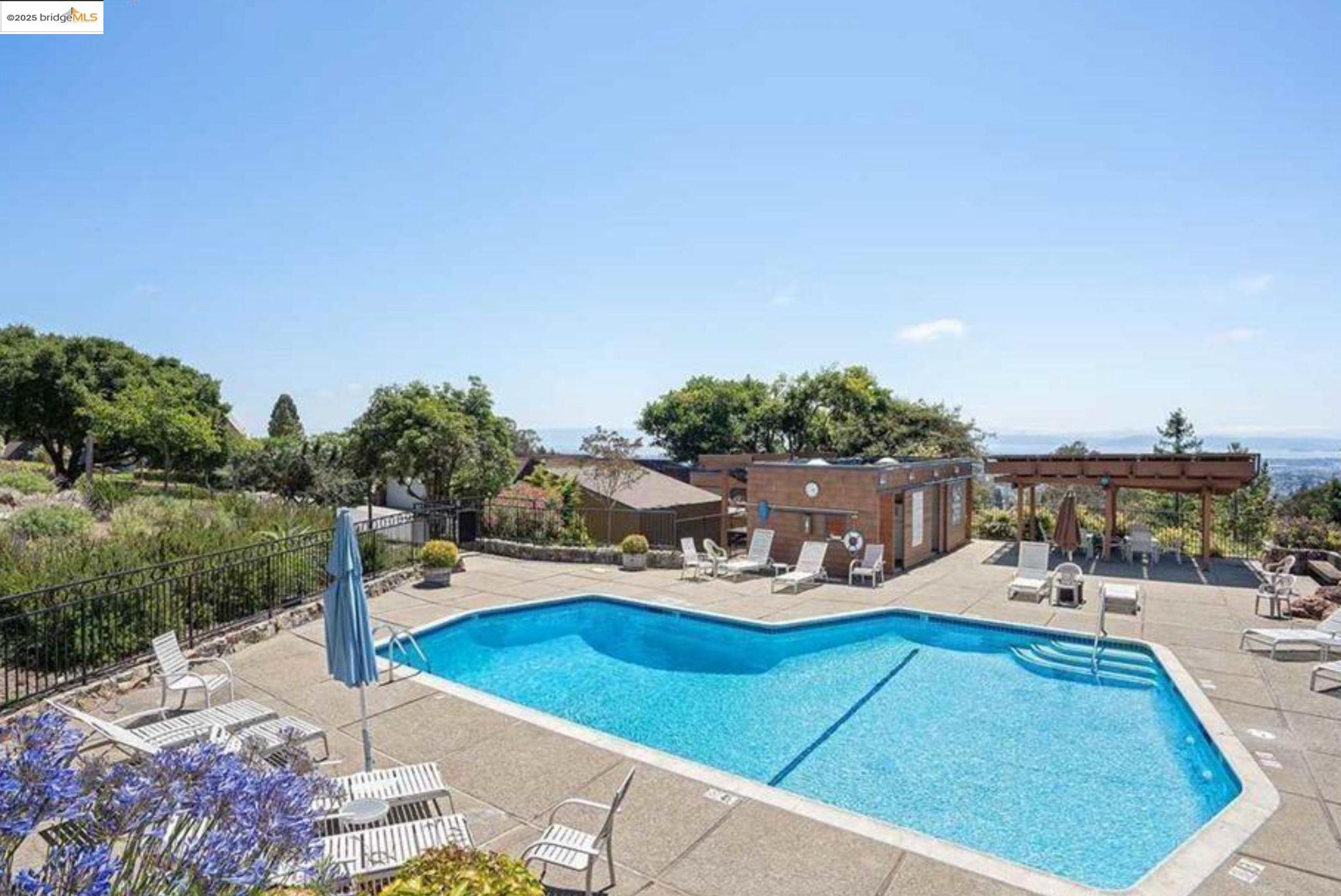 2 Sereno Circle Oakland, CA 94619 - Photo 36 of 42 a view of a chairs and table on the terrace
