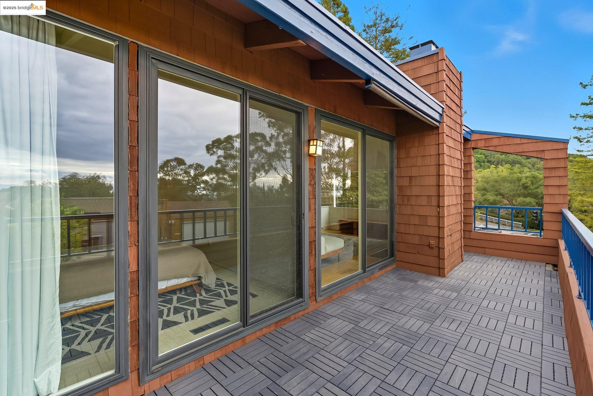 2 Sereno Circle Oakland, CA 94619 - Photo 7 of 42 a view of a balcony with wooden floor