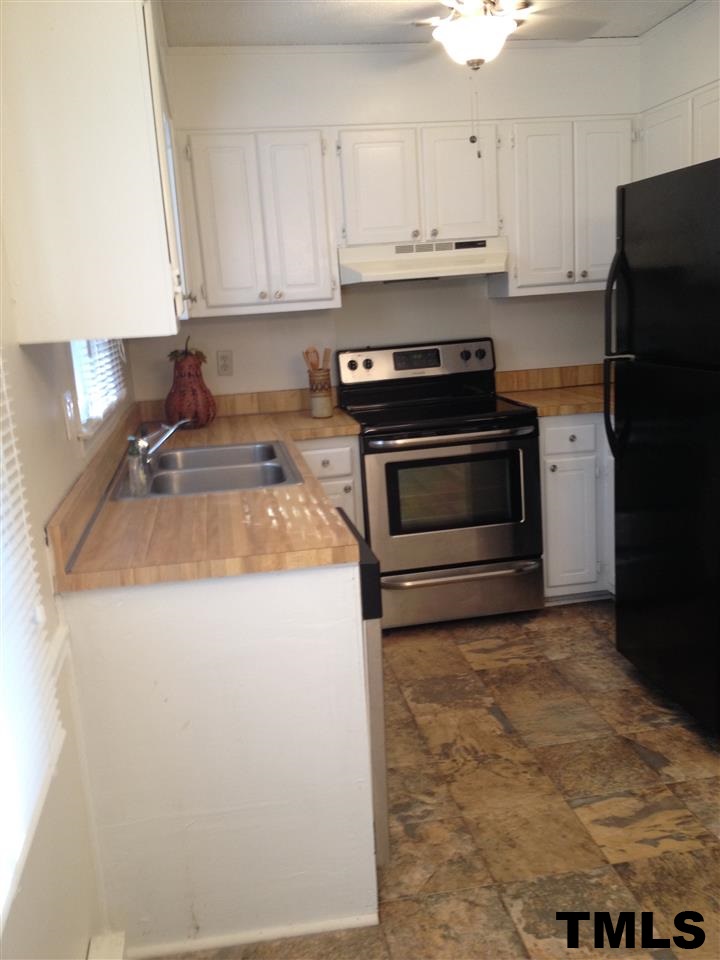 1105 Mockingbird Drive Raleigh, NC 27615 - Photo 5 of 15 Smooth top range, dishwasher, refrigerator